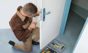 Professional door repairdoor repair services technician installing stainless steel rollers on Florida sliding glass door with ocean view